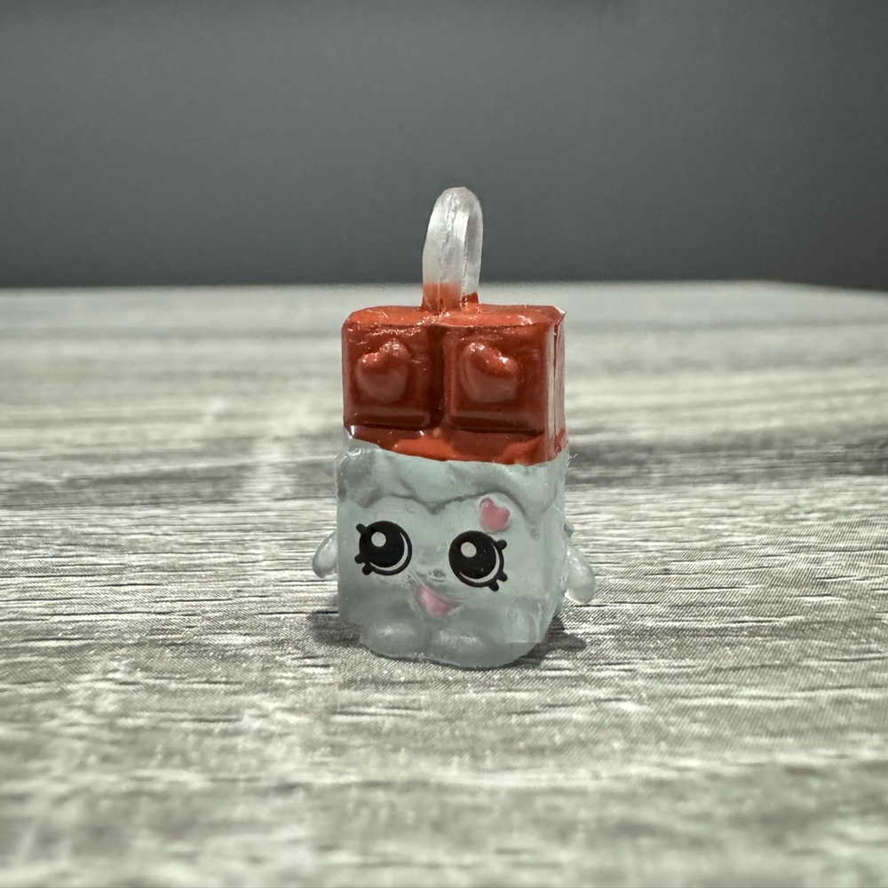 Shopkins | Charms: Brown/Translucent Cheeky Chocolate (5-103) - Mini Figure
